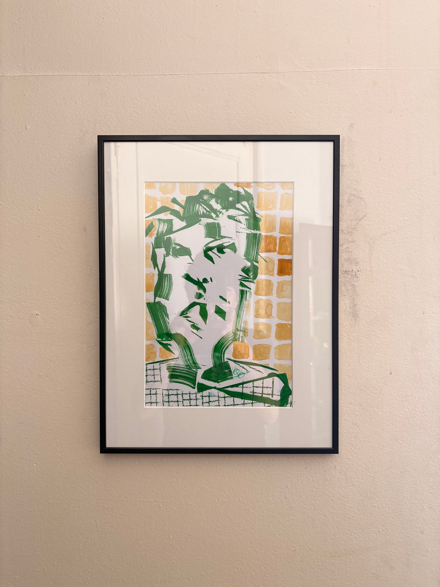 Le garçon triste aux carrés jaunes